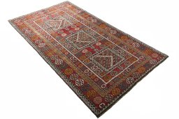 Close-up detail of 2000s Torkaman rug from Iran / Persia showing Wool weave