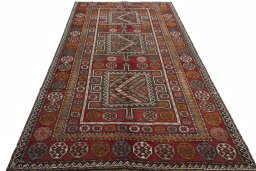 Surface texture of 2000s Torkaman rug with natural Wool and intricate pattern