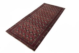 Corner detail of 1970s Torkaman rug showing border pattern and Wool pile