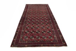 Surface texture of 1970s Torkaman rug with natural Wool and intricate pattern