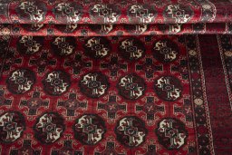 Full view of 1970s Torkaman rug from Iran / Persia, 295 × 140 cm in Red tones
