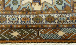 Close-up detail of 2000s Torkaman rug from Iran / Persia showing Wool weave