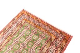Surface texture of 1995s Torkaman rug with natural Wool and intricate pattern