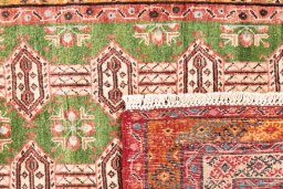 Close-up detail of 1995s Torkaman rug from Iran / Persia showing Wool weave