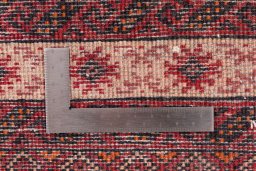 Corner detail of 1995s Torkaman rug showing border pattern and Wool pile