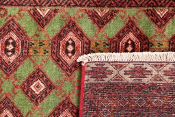 Close-up detail of 1995s Torkaman rug from Iran / Persia showing Wool weave