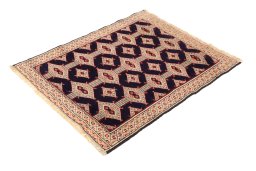 Corner detail of 1990s Torkaman rug showing border pattern and Wool pile