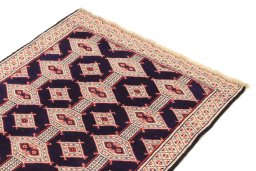 Surface texture of 1990s Torkaman rug with natural Wool and intricate pattern
