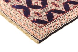 Backside of handmade 1990s Torkaman rug showing knot structure and weave density