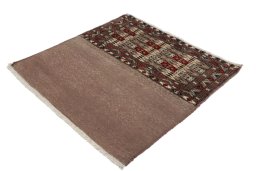 Corner detail of 2000s Torkaman rug showing border pattern and Wool pile