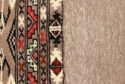 Close-up detail of 2000s Torkaman rug from Iran / Persia showing Wool weave