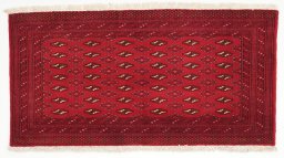 Full view of 2000s Torkaman rug from Iran / Persia, 125 × 65 cm in Red tones