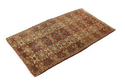 Corner detail of 1990s Torkaman rug showing border pattern and Wool pile
