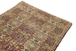 Surface texture of 1990s Torkaman rug with natural Wool and intricate pattern