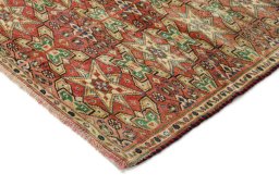 Backside of handmade 1990s Torkaman rug showing knot structure and weave density