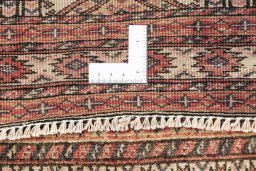 Corner detail of 1990s Torkaman rug showing border pattern and Wool pile