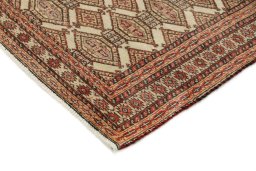 Backside of handmade 1990s Torkaman rug showing knot structure and weave density