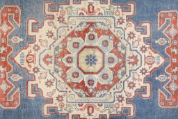 Backside of handmade 1920s Wiss rug showing knot structure and weave density
