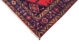 Backside of handmade 1940s Wiss rug showing knot structure and weave density