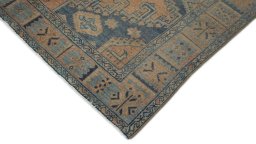 Backside of handmade 1940s Wiss rug showing knot structure and weave density