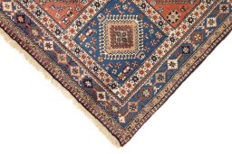Backside of handmade 1990s Yalameh rug showing knot structure and weave density