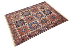 Corner detail of 1990s Yalameh rug showing border pattern and Wool pile