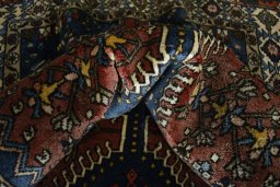 Corner detail of 2000s Yalameh rug showing border pattern and Wool pile