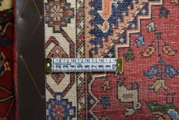 Corner detail of 2000s Yalameh rug showing border pattern and Wool pile