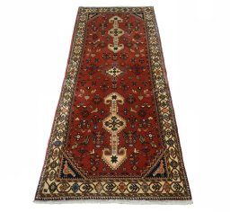 Surface texture of 2000s Yalameh rug with natural Wool and intricate pattern