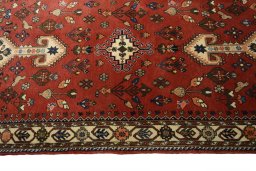 Close-up detail of 2000s Yalameh rug from Iran / Persia showing Wool weave