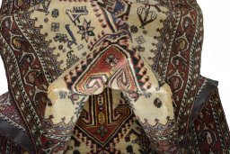 Corner detail of 2000s Yalameh rug showing border pattern and Wool pile