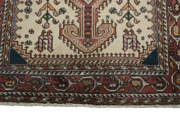 Central medallion detail of 2000s Yalameh rug from Iran / Persia
