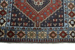 Central medallion detail of 2000s Yalameh rug from Iran / Persia