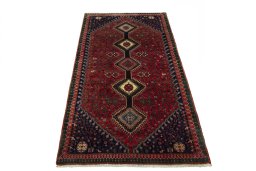 Surface texture of 2000s Yalameh rug with natural Wool and intricate pattern