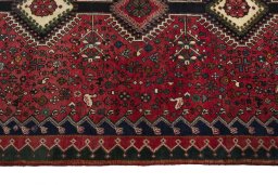 Close-up detail of 2000s Yalameh rug from Iran / Persia showing Wool weave