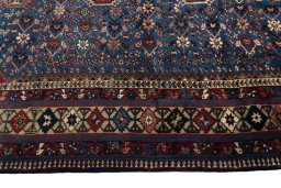 Close-up detail of 1970s Yalameh rug from Iran / Persia showing Wool weave