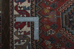 Close-up detail of 2000s Yalameh rug from Iran / Persia showing Wool weave