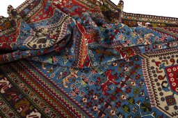 Surface texture of 1970s Yalameh rug with natural Wool and intricate pattern
