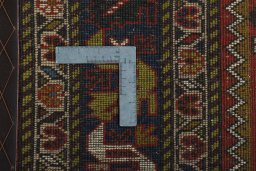 Backside of handmade 1970s Yalameh rug showing knot structure and weave density