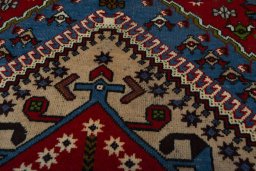 Central medallion detail of 1970s Yalameh rug from Iran / Persia