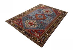 Corner detail of 1970s Yalameh rug showing border pattern and Wool pile