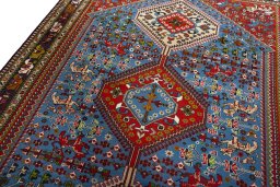 Backside of handmade 1970s Yalameh rug showing knot structure and weave density