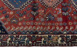 Close-up detail of 1970s Yalameh rug from Iran / Persia showing Wool weave