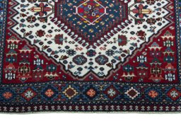 Central medallion detail of 2000s Yalameh rug from Iran / Persia