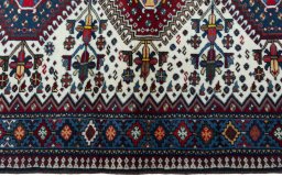 Close-up detail of 2000s Yalameh rug from Iran / Persia showing Wool weave