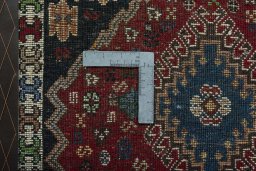Corner detail of 2000s Yalameh rug showing border pattern and Wool pile