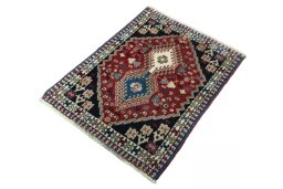 Corner detail of 2000s Yalameh rug showing border pattern and Wool pile