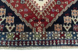 Close-up detail of 2000s Yalameh rug from Iran / Persia showing Wool weave