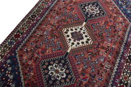 Backside of handmade 2000s Yalameh rug showing knot structure and weave density