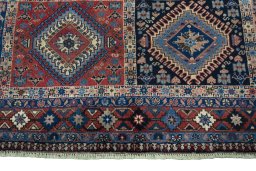 Central medallion detail of 2000s Yalameh rug from Iran / Persia